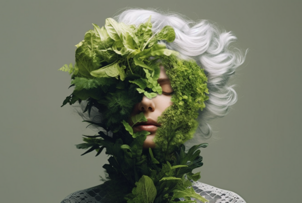 A woman with a green face covered in leaves is featured in the image. Her hair is white, creating a striking contrast against the vibrant green foliage. The leaves completely obscure her face, adding an element of mystery to her appearance. The woman''s expression is hidden, leaving her emotions a mystery to the viewer. The intricate details of the leaves and the soft texture of her hair create a visually captivating scene. The overall composition evokes a sense of nature and transformation, as if the woman is merging with the environment around her.